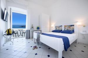 Cama ou camas em um quarto em Vista d'Amalfi