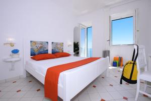 Cama ou camas em um quarto em Vista d'Amalfi
