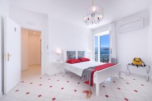 Cama ou camas em um quarto em Vista d'Amalfi