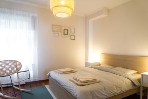 Llit o llits en una habitació de A9A (Audēju 9 apartamenti)