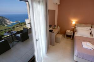 A bed or beds in a room at Petani Resort