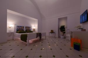 a bedroom with a bed in a room with stars on the floor at Vista d'Amalfi in Amalfi +37 photos