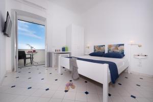 Cama ou camas em um quarto em Vista d'Amalfi