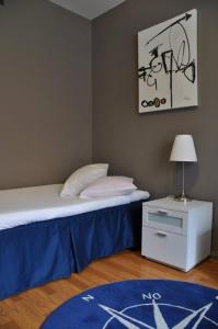 Letto o letti in una camera di Strand Hotell