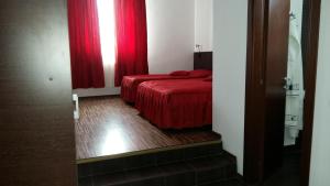 Ένα ή περισσότερα κρεβάτια σε δωμάτιο στο Motel Cargo +60 φωτογραφίες