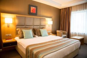 Postel nebo postele na pokoji v ubytování Efeler Hotel + 37 fotografií
