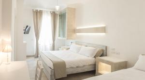 Posteľ alebo postele v izbe v ubytovaní Bed & Breakfast AMATI