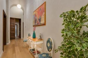 A seating area at Residenza D'Epoca Historia Luxury Boutique