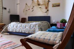 Postel nebo postele na pokoji v ubytování Orchidea apartments