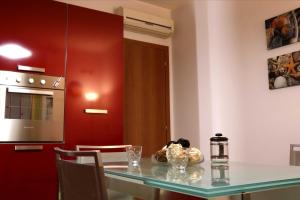 Kuchyň nebo kuchyňský kout v ubytování Orchidea apartments