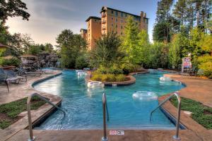 a swimming pool in the middle of a city at RiverStone Condo Resort & Spa in Pigeon Forge
