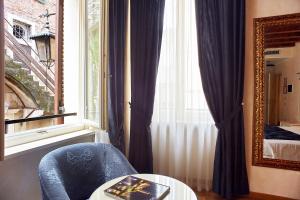 Uma cama ou camas num quarto em Albergo Mazzanti