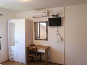 TV a/nebo společenská místnost v ubytování Villa Radovic
