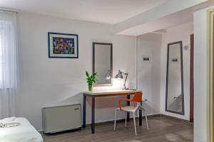 Postel nebo postele na pokoji v ubytování Hotel Skradinski Buk