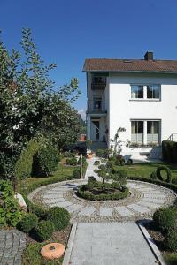 a house with a walkway in front of a building at Haus Pollak in Waldkirchen