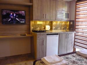 Kuchyň nebo kuchyňský kout v ubytování Street61 Apart Hotel