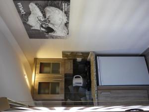 Kuchyň nebo kuchyňský kout v ubytování Street61 Apart Hotel