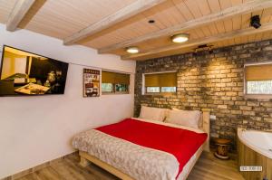 Un pat sau paturi într-o cameră la Dream Cabin