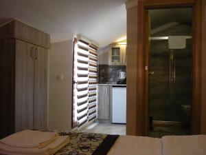 Kuchyň nebo kuchyňský kout v ubytování Street61 Apart Hotel