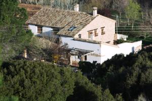 an aerial view of a house on a hill at Casa del Rio in Villanueva de la Jara