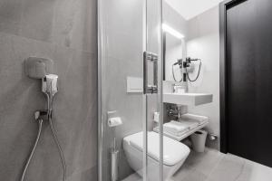 Koupelna v ubytování Theresian Hotel