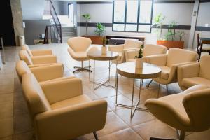 Area soggiorno di Class Hotel Varginha