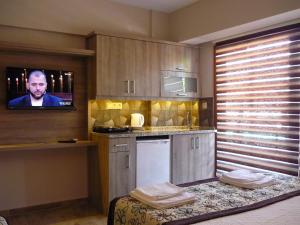 Kuchyň nebo kuchyňský kout v ubytování Street61 Apart Hotel