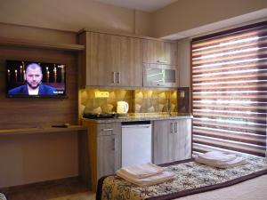 Kuchyň nebo kuchyňský kout v ubytování Street61 Apart Hotel