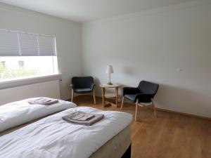 Postel nebo postele na pokoji v ubytování Stekkar 23