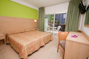 TV a/nebo společenská místnost v ubytování Hotel Perla