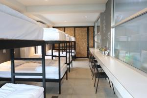 Voodi või voodid majutusasutuse Sleeping Well Chiangkhong toas