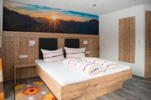 Letto o letti in una camera di Haus Moosbrugger