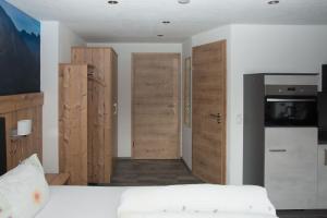 Letto o letti in una camera di Haus Moosbrugger