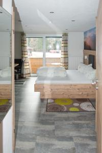 Letto o letti in una camera di Haus Moosbrugger