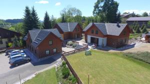 an aerial view of a house with a yard at Chaty Vrchlabí in Vrchlabí