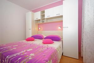 Postel nebo postele na pokoji v ubytování Apartments Senka