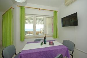 TV a/nebo společenská místnost v ubytování Apartments Senka