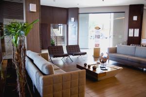 Area soggiorno di Class Hotel Varginha