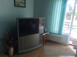 TV a/nebo společenská místnost v ubytování Casa Cristina