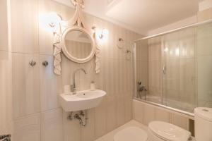 Kúpeľňa v ubytovaní Apartment Sunrise + 16 fotografií