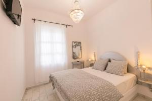 Posteľ alebo postele v izbe v ubytovaní Apartment Sunrise