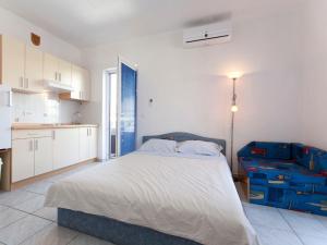 Cama o camas de una habitación en Apartments & Rooms Nikolić