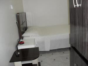 Postel nebo postele na pokoji v ubytování Hotel Niteroi