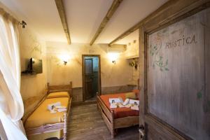 Postel nebo postele na pokoji v ubytování Antico Borgo Marchese