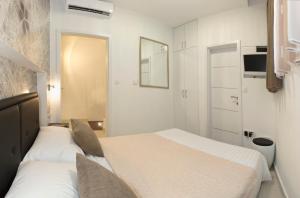 Voodi või voodid majutusasutuse Apartment & Room Split Lea toas
