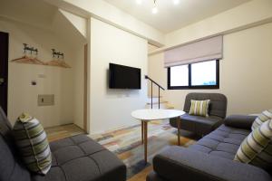 TV a/nebo společenská místnost v ubytování Taroko Mountain View B&B