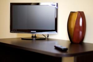 TV a/nebo společenská místnost v ubytování B&B La Porta Accanto