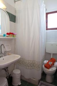 Ванная комната в Hotel Cyclades