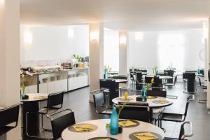 Εστιατόριο ή άλλο μέρος για φαγητό στο Hotel Santoni Freelosophy ***