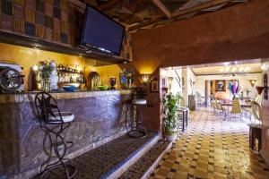 Khu vực lounge/bar tại Hotel Kasbah Le Mirage & Spa